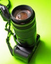 A digital SLR with a telephoto Royalty Free Stock Photo