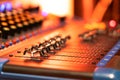 Digital sound station control panel, equalizer, mixer and professional equipment, bokeh light background, selective focus Royalty Free Stock Photo