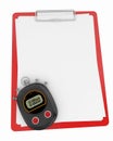 Digital stopwatch and blank notepad