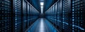 Digital Symphony: Illuminated Server Farm Corridor Royalty Free Stock Photo