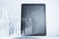 Digital tablet with blank screen and stock analytics interface Royalty Free Stock Photo