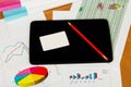 Digital Tablet, clean business card, stationery and drawing on desktop.