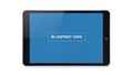 Digital tablet displaying a blueprint grid layout interface for design planning Royalty Free Stock Photo