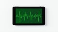 Digital tablet displays green electrocardiogram (ECG) graph. Royalty Free Stock Photo
