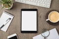 Digital tablet mock up on wooden desk