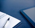 Digital tablet pc near notes in the office, concept of new technology Royalty Free Stock Photo