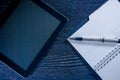 Digital tablet pc near notes in the office, concept of new technology Royalty Free Stock Photo
