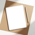 Digital tablet and stylus on brown surface Royalty Free Stock Photo