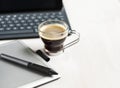 Digital tablet, stylus pen, tablet pad and cup of coffee.