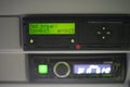 Digital tachograph with 15 minutes of driving left warning on display before driver must take a brake. Royalty Free Stock Photo