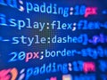 Digital technology background. Webdesigner Workstation. Programmer working in desktop laptop. Code on the computer screen. Disco