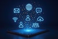 Digital technology icons emerging from a tablet screen with glowing particles internet communication Royalty Free Stock Photo