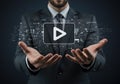 Businessman Hands Presenting Digital Media Play Button Interface with Futuristic Data Graphics Royalty Free Stock Photo