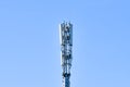 Digital telephone antenna. GSM tower on a blue background. 5g 4g Royalty Free Stock Photo