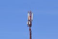 Digital telephone antenna. GSM tower on a blue background. 5g 4g Royalty Free Stock Photo