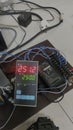 Digital Temperature Controller Displaying 25.12 Degrees Celsius Royalty Free Stock Photo