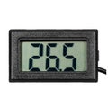 Digital thermo-hygrometer with numbers on the LCD display Royalty Free Stock Photo