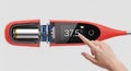 Digital thermometer cross-section reveals internal components and 37.5 degrees Celsius reading Royalty Free Stock Photo