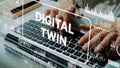 Digital Twin Concept with Hands Typing on Laptop Surrounded by Data Visualizations and Analytics Graphics. Asymptotic Royalty Free Stock Photo