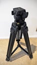 Digital video camera tripod for film and movie making Royalty Free Stock Photo