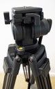 Digital video camera tripod for film and movie making Royalty Free Stock Photo