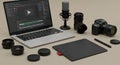 Digital Video Editing Workspace with Laptop, Camera, and Microphone Royalty Free Stock Photo