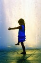 Digitally altered image of a little girl playing in fountain at Dorothy Chandler Pavilion, Los Angeles, CA