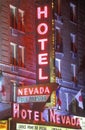 Digitally altered image of a neon sign that reads ï¿½Hotel Nevada - Free Parkingï¿½ Royalty Free Stock Photo