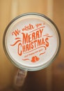 Digitally composite christmas and new year wishes in coffee froth