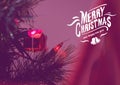 Digitally composite image of merry christmas message against christmas decoration Royalty Free Stock Photo