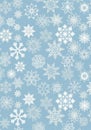 A digitally created pattern of various intricate white snowflakes on a light blue Royalty Free Stock Photo