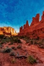 Digitally created watercolor painting of Park Avenue Trailhead with hiking trail in Arches National Park, Moab, Utah