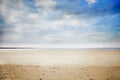Digitally generated beach under cloudy sky Royalty Free Stock Photo