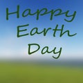 Digitally generated Happy Earth Day on blur back vector