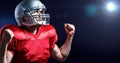 Digitally generated image of american football player cheering with clenched fist Royalty Free Stock Photo