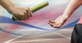 Digitally generated image of hands passing the baton Royalty Free Stock Photo