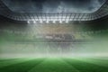 Misty football stadium under spotlights Royalty Free Stock Photo