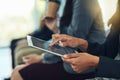 Digitizing her conference notes. a businesswoman using a digital tablet during a conference in a modern office. Royalty Free Stock Photo