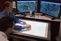 Digitizing maps at the ESRI user conference Royalty Free Stock Photo
