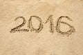 2016 digits written on sand at beach Royalty Free Stock Photo