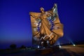 Dignity statue in oacama SD at night