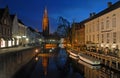 The Dijver Canal with the Church of Our Lady in Brugge, Belgium Royalty Free Stock Photo