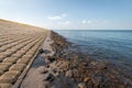 Dike revetment on the bank of a Dutch estuary Royalty Free Stock Photo