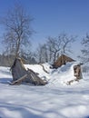 Dilapidated alpine hut in winter Royalty Free Stock Photo