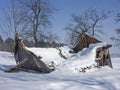 Dilapidated alpine hut in winter Royalty Free Stock Photo