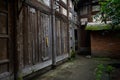 Dilapidated ancient Chinese wood structural dwelling building Royalty Free Stock Photo