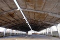 A dilapidated concrete industrial structure. Storage with concrete roof