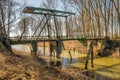 Dilapidated drawbridge over a river