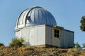 dilapidated observatory satelite building in sun midday
