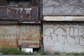 Dilapidated wall with some graffiti Royalty Free Stock Photo